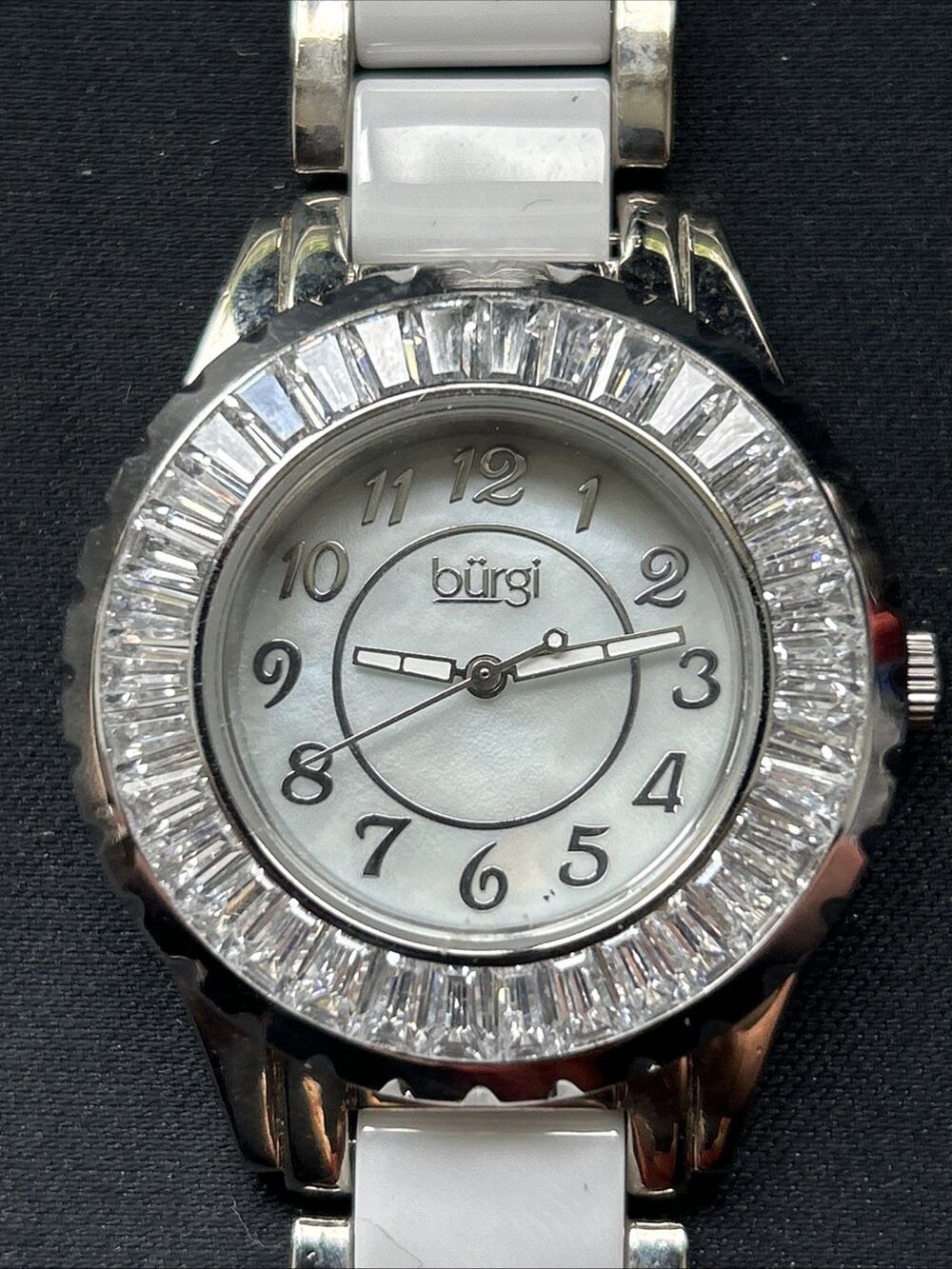 Burgi White And Silver Tone Rhinestone Bezel Women’s Quartz Watch
